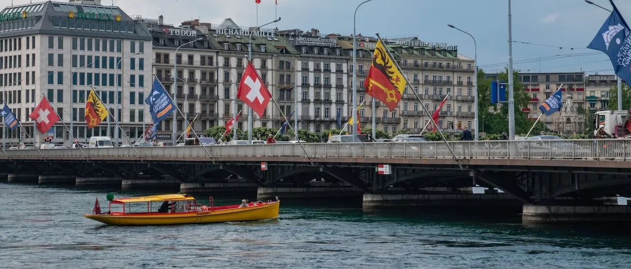 domiciliation genève suisse pont du mont blanc genève drapeau suisse